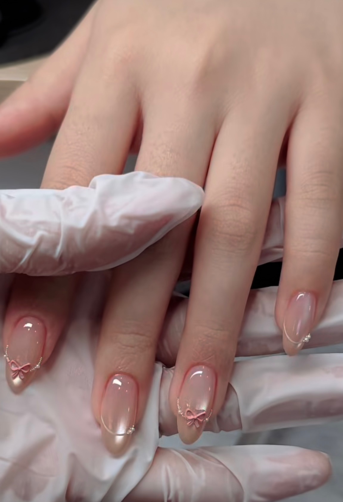Nude bow detail nails at Chloe Nail Spa